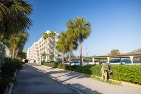 commercial landscape maintenance crew trimming 12
