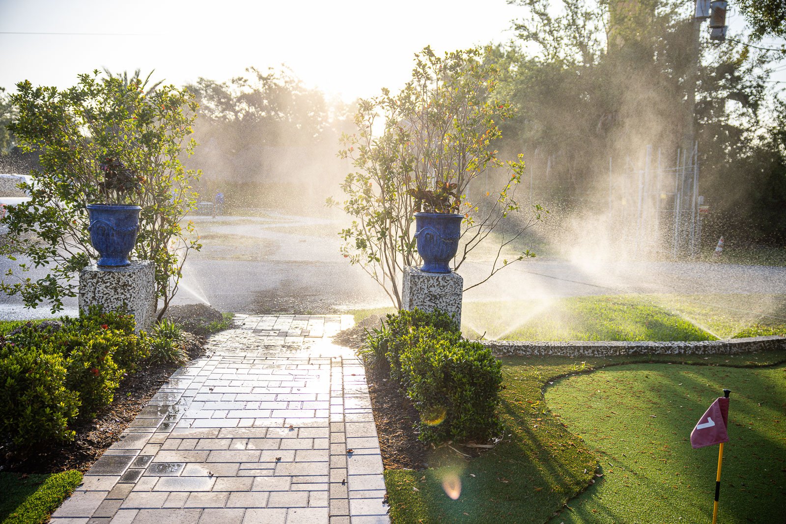 Irrigation system running in front yard