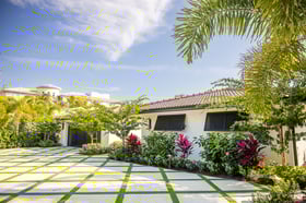 concrete poured pavers with artificial turf driveway 1