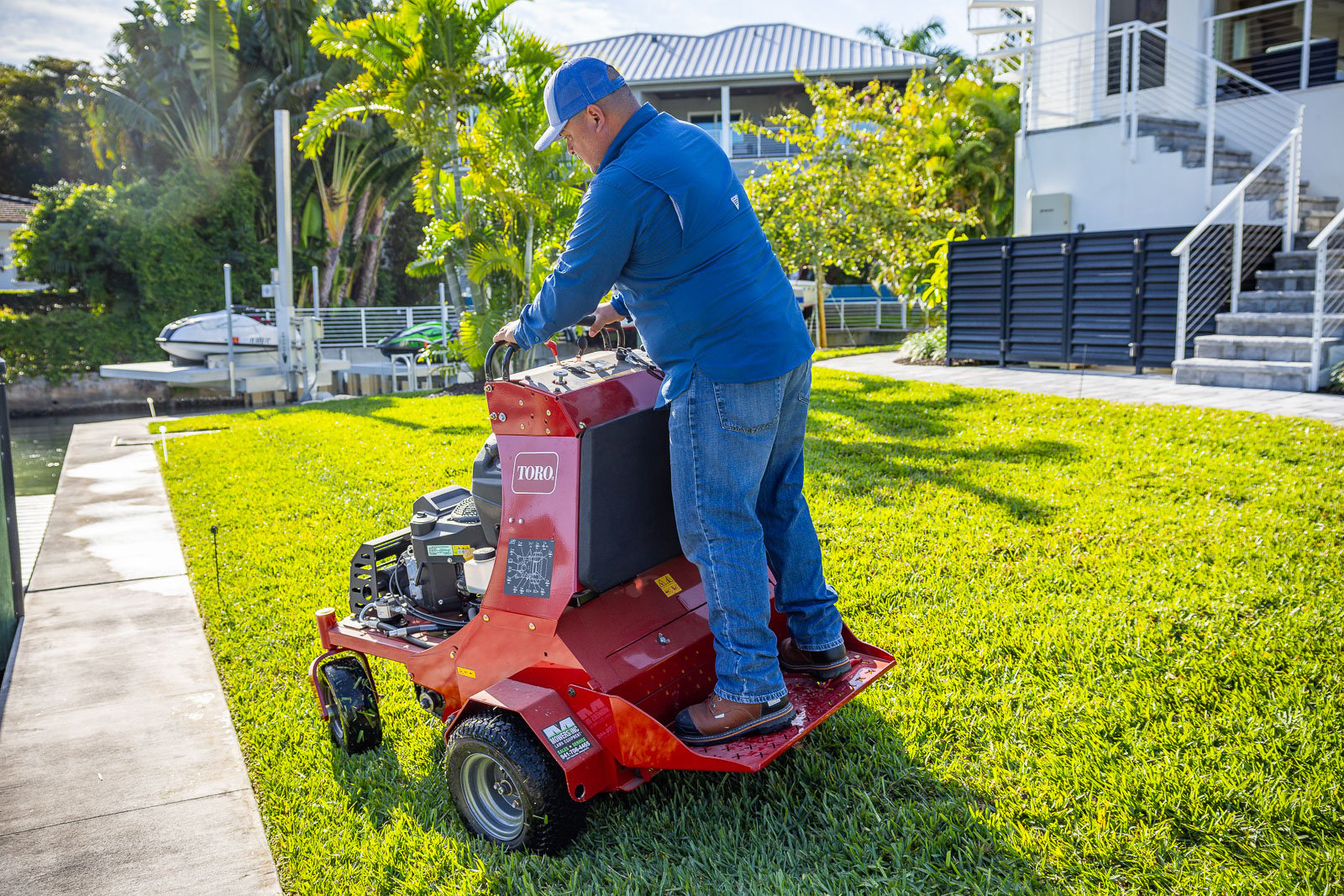 landscape maintenance crew aerating lawn 2