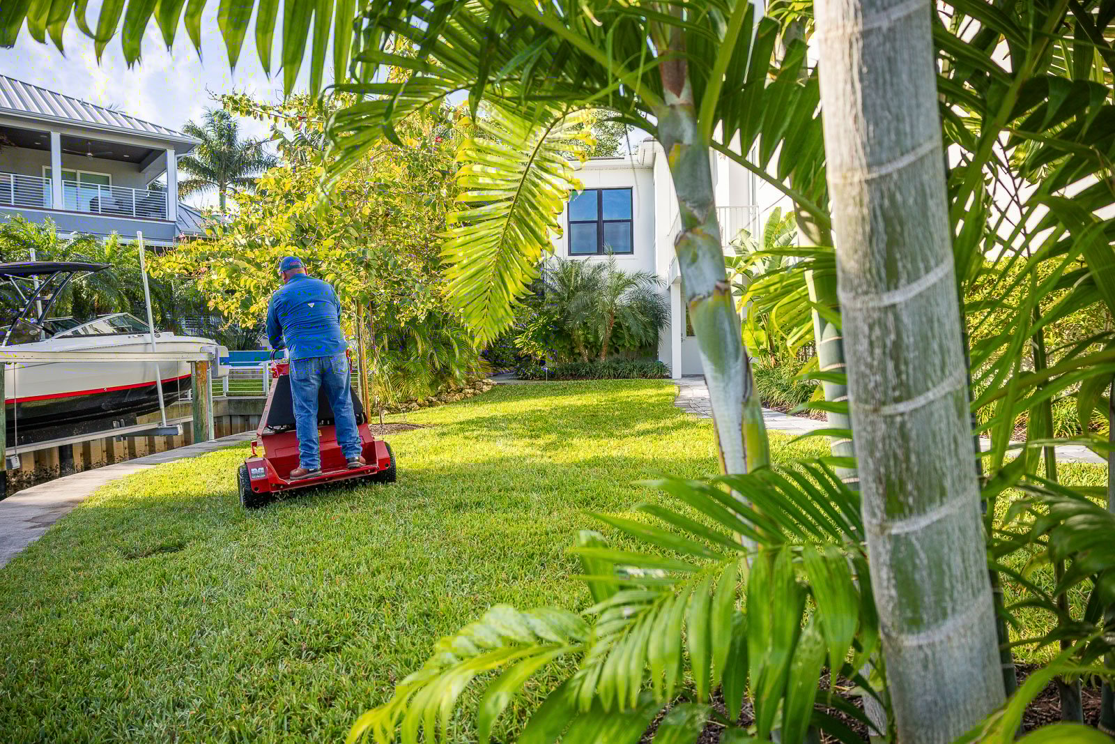 landscape maintenance crew aerating lawn3
