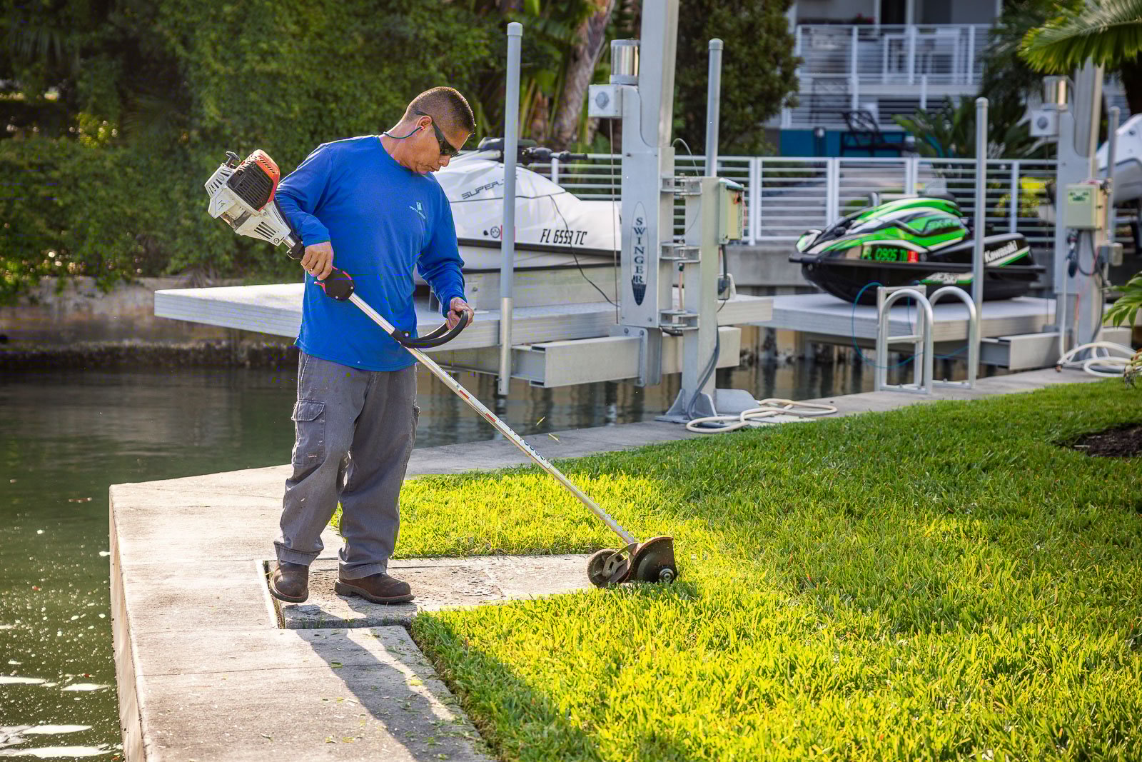landscape maintenance crew edging in yard-1