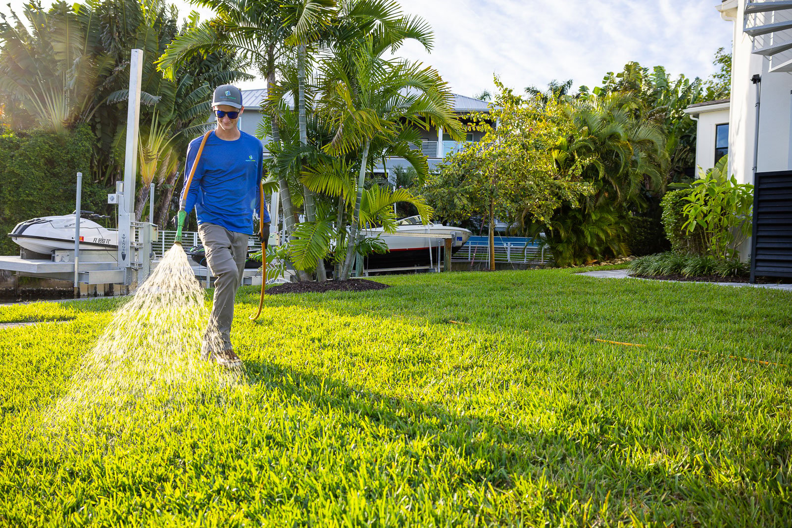 lawn care technician treating lawn 5