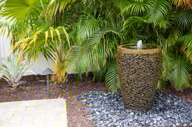 paver patio with landscape beds backyard water feature 1