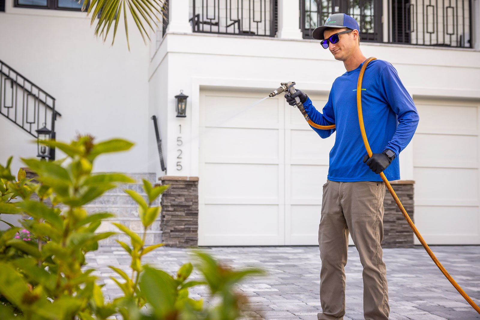 plant health care technician spraying plants 4