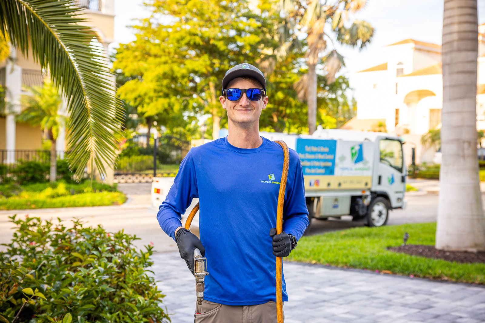 plant health care technician spraying plants 9