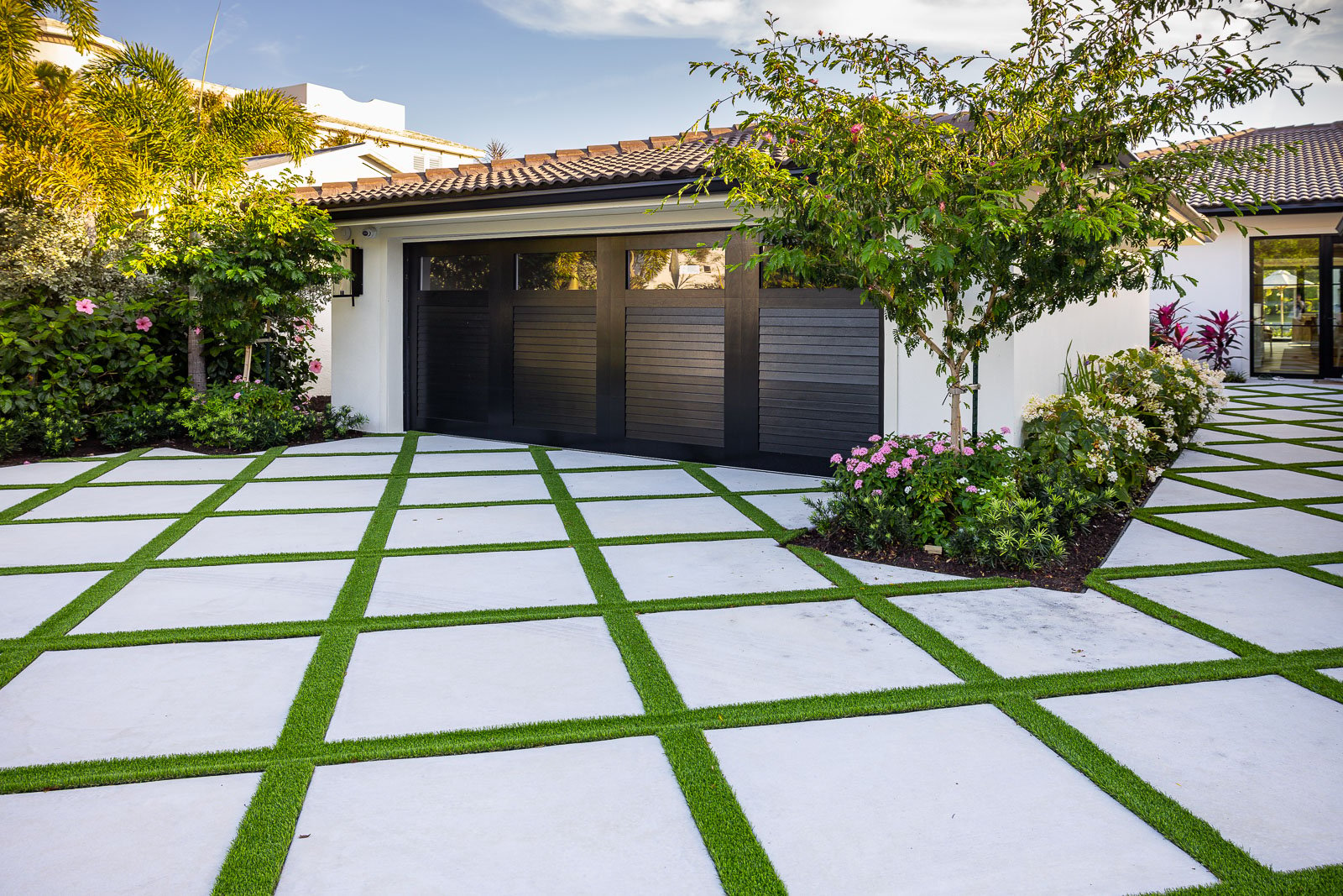 poured concrete pavers with artificial turf 5