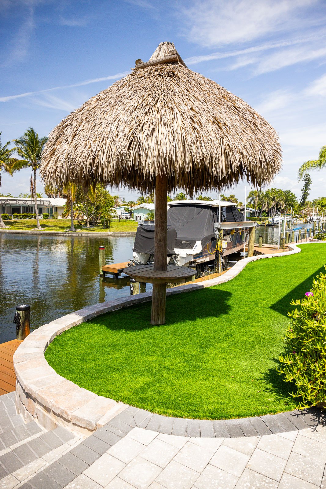 tiki umbrella and artificial turf 