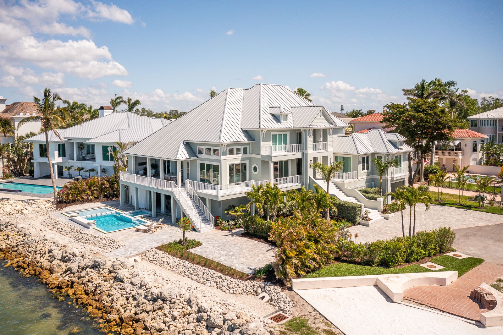 aerial view sea wall landscape beds water pool patio 1