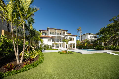 larger green lawn patio with pool 