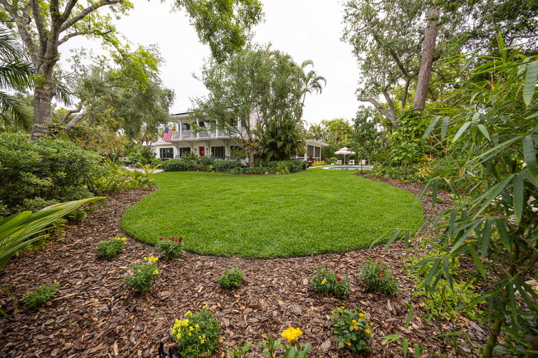 front yard landscape beds green lawn 