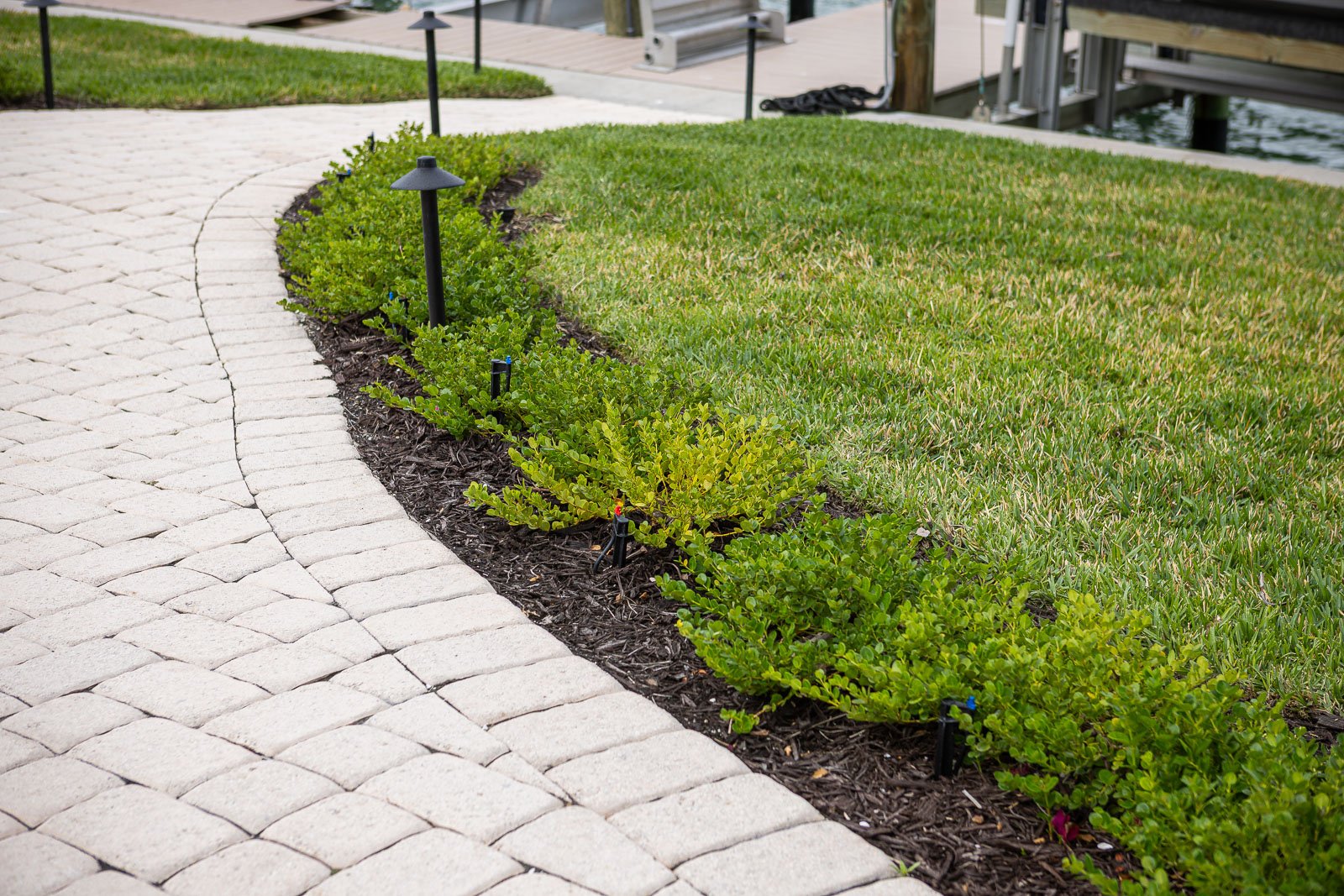 landscape beds outdoor lighting paver patio 