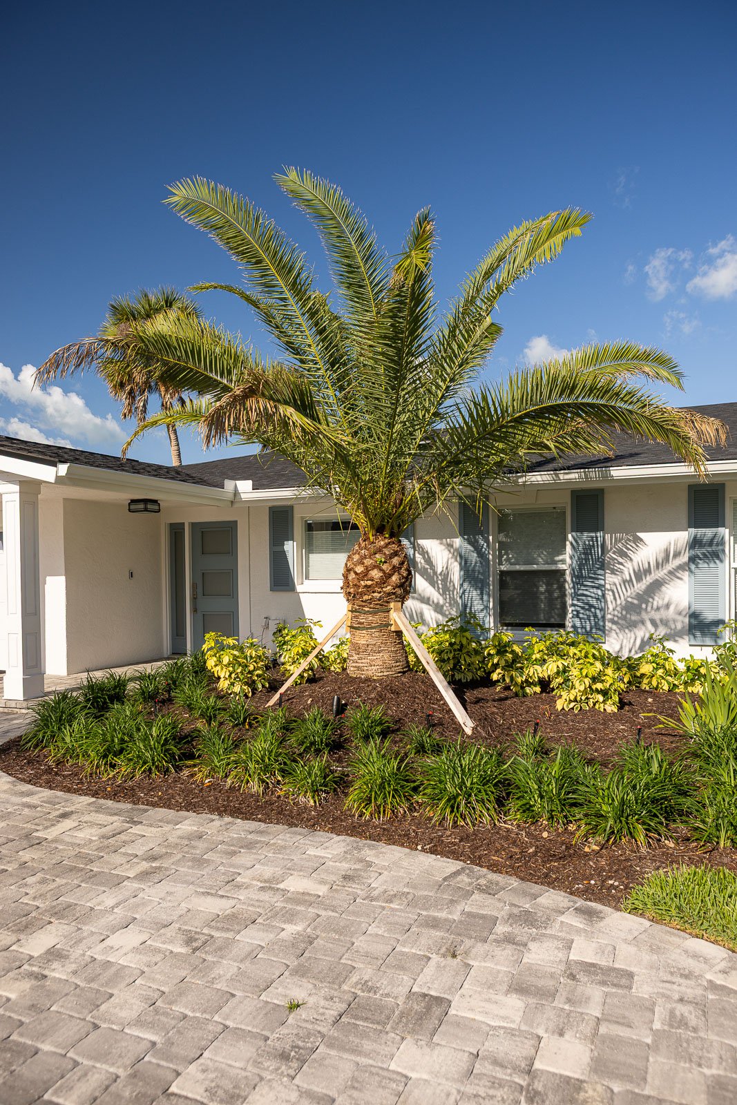 paver driveway landscape beds front of house 7
