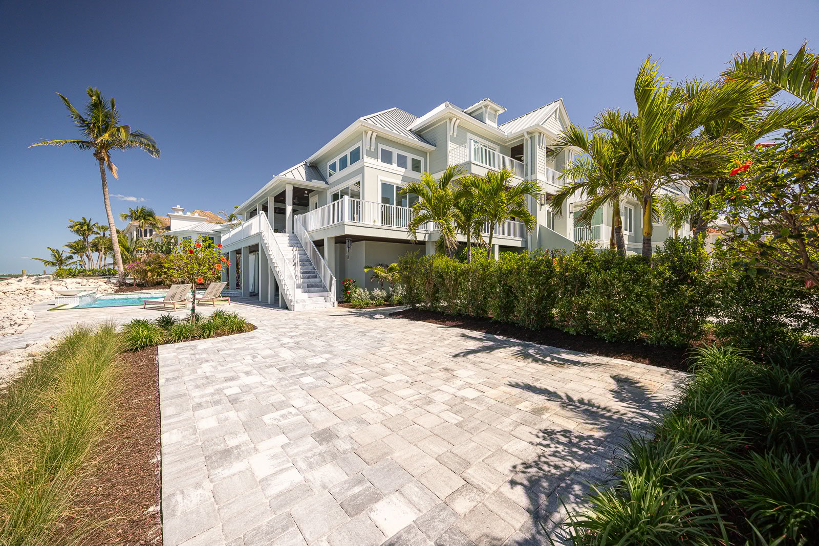 sea wall outdoor seating pool patio 2-1