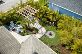 aerial view of landscape design backyard paver patio landscape beds pergola 3