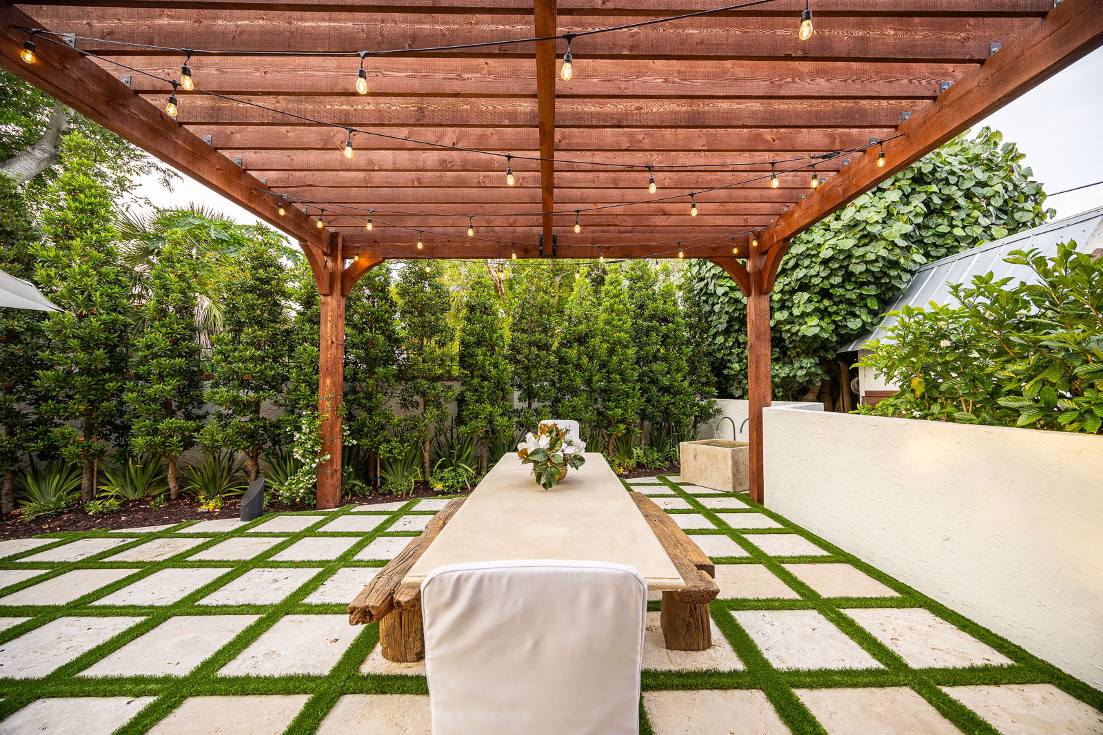 backyard patio pergola gate outdoor dining bistro lights 2