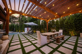 landscape beds backyard outdoor dining bistro lights