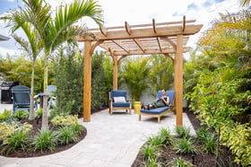 landscape design client reading seating pergola paver patio walkway