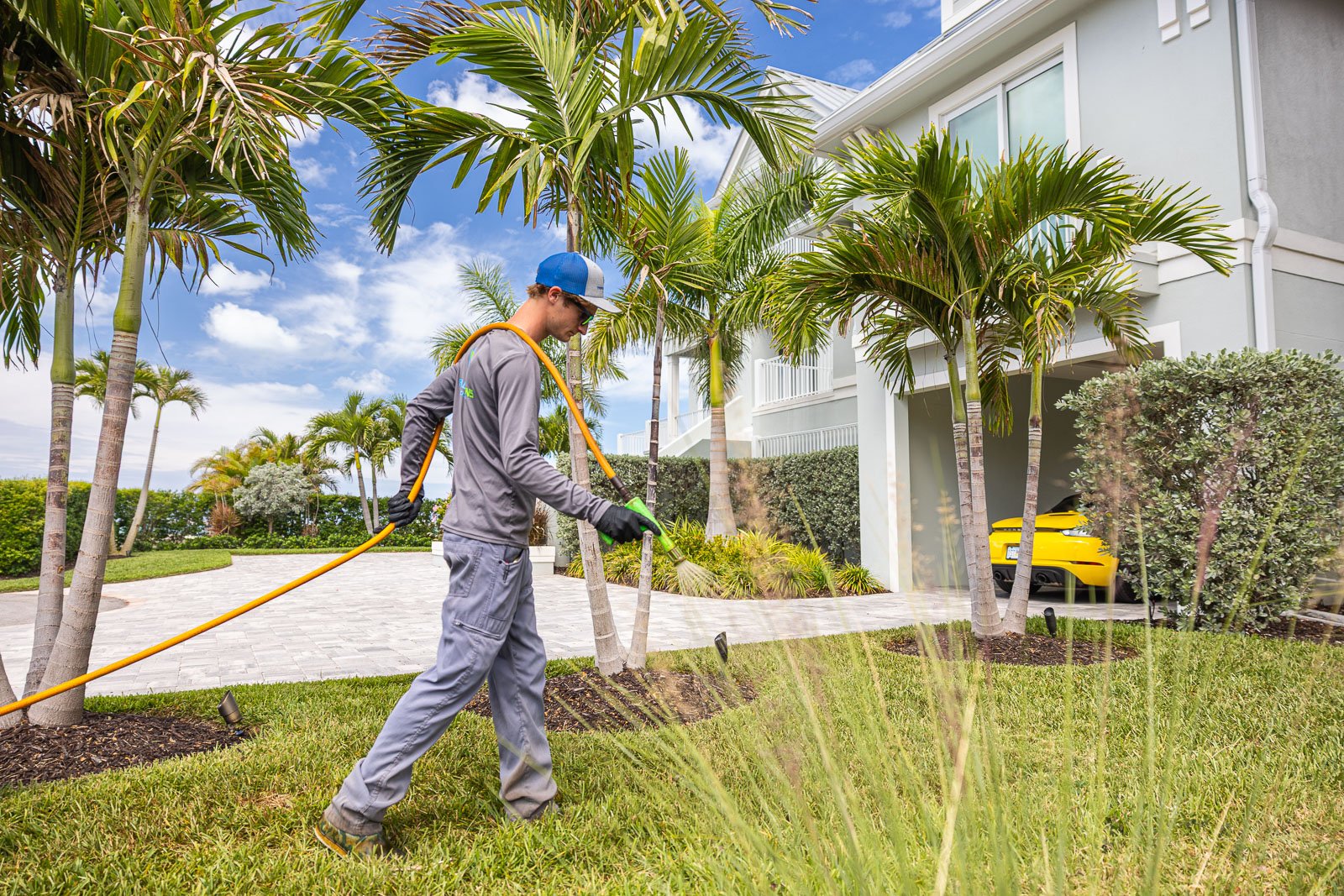 lawn care crew spraying lawn 1