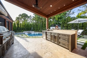 outdoor kitchen pergola pool