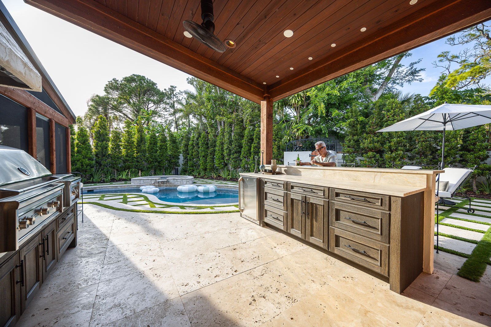 outdoor kitchen pergola pool