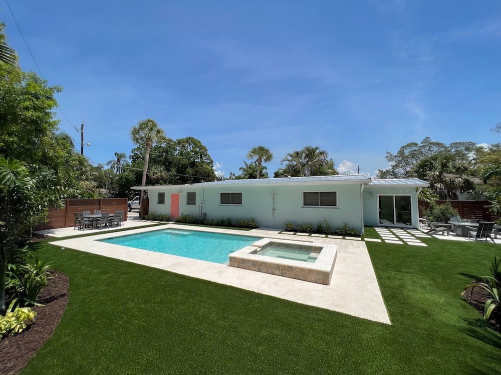 backyard pool with paver patio