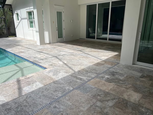 stone patio around pool 