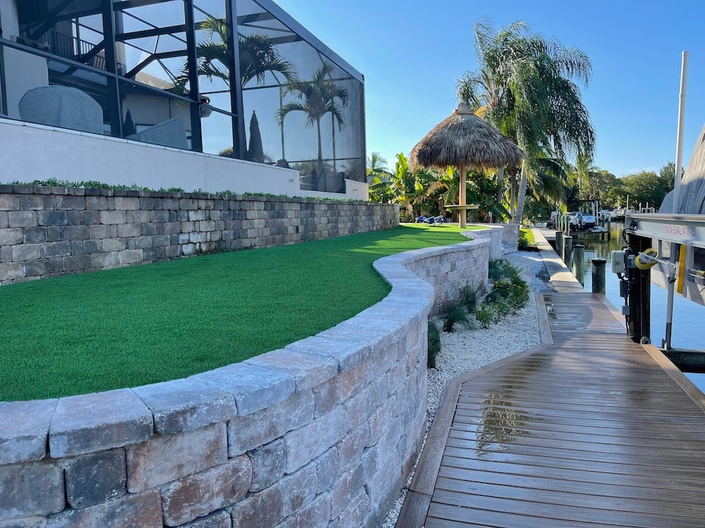 tiered yard with retaining wall on canal