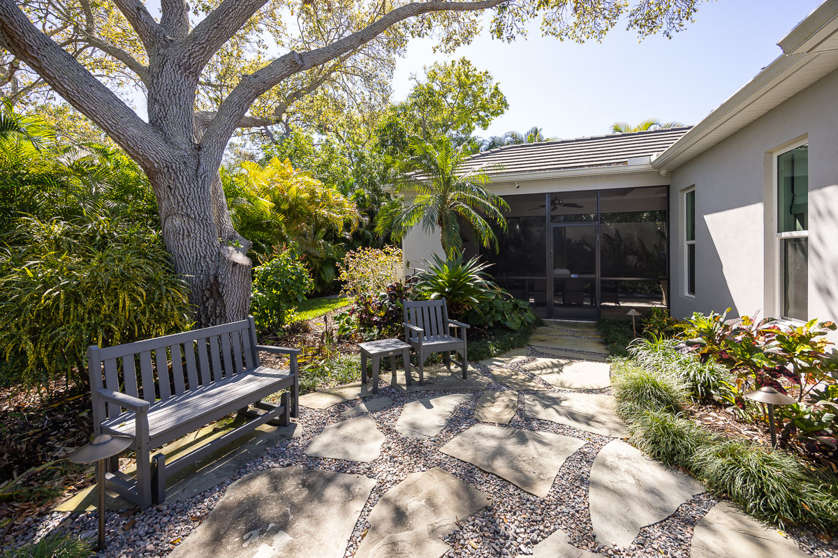 backyard oasis with benches patio and landscaping 