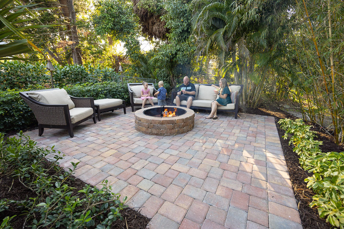 fire pit on patio with family