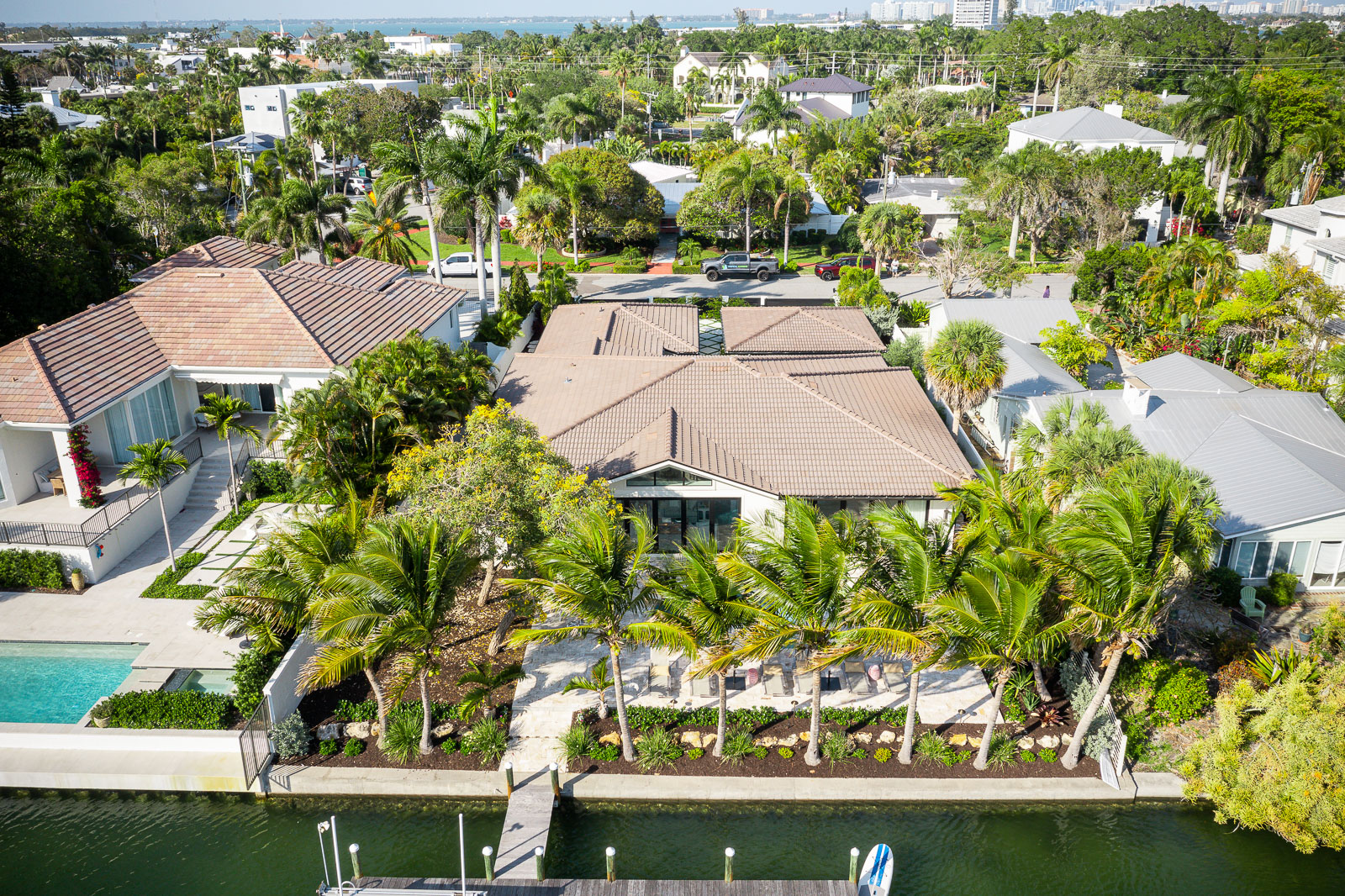 aerial view of house with landscape design 