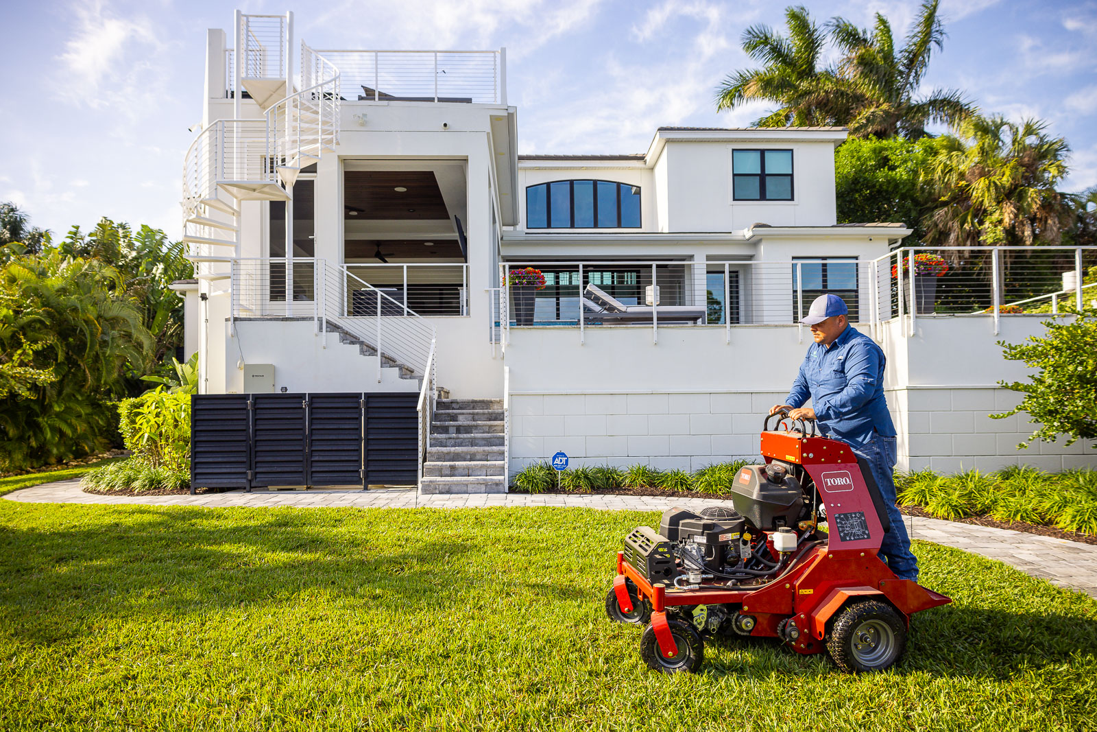 landscape maintenance crew aerating lawn 5