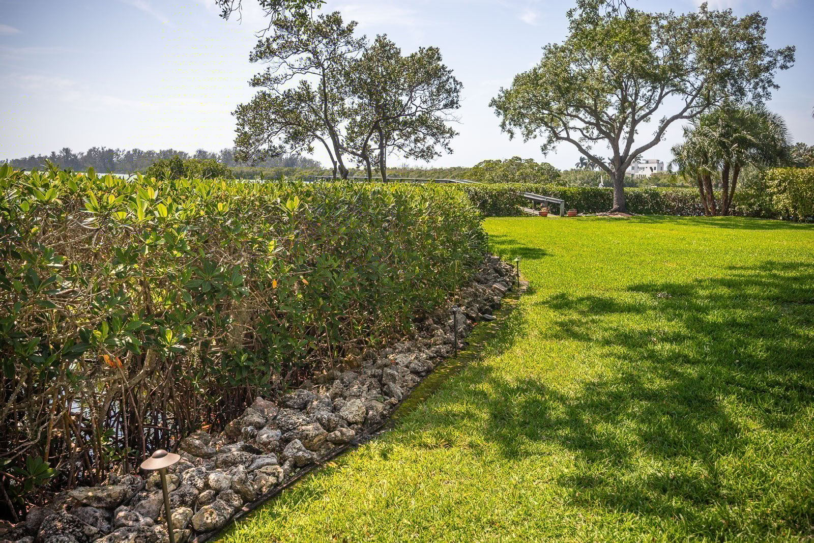 landscape maintenance flower beds green grass