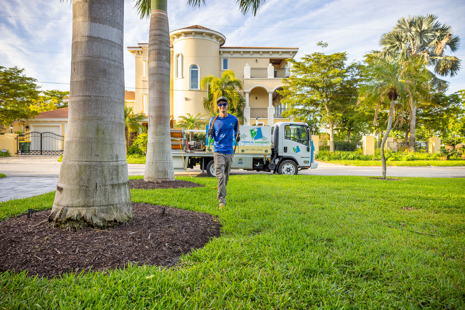 lawn care technician treating lawn 1