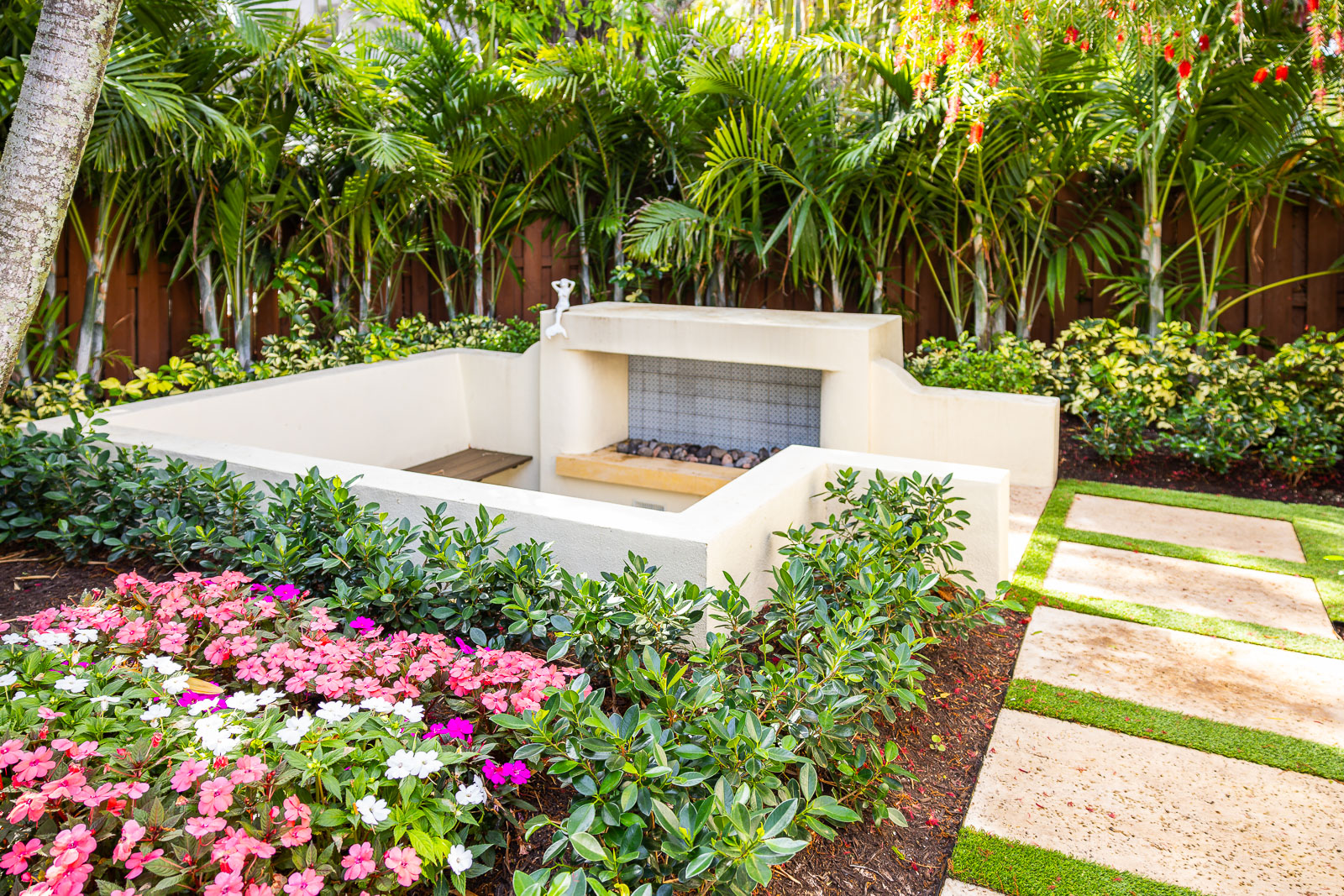 sunken garden with walkway and plants colorful 