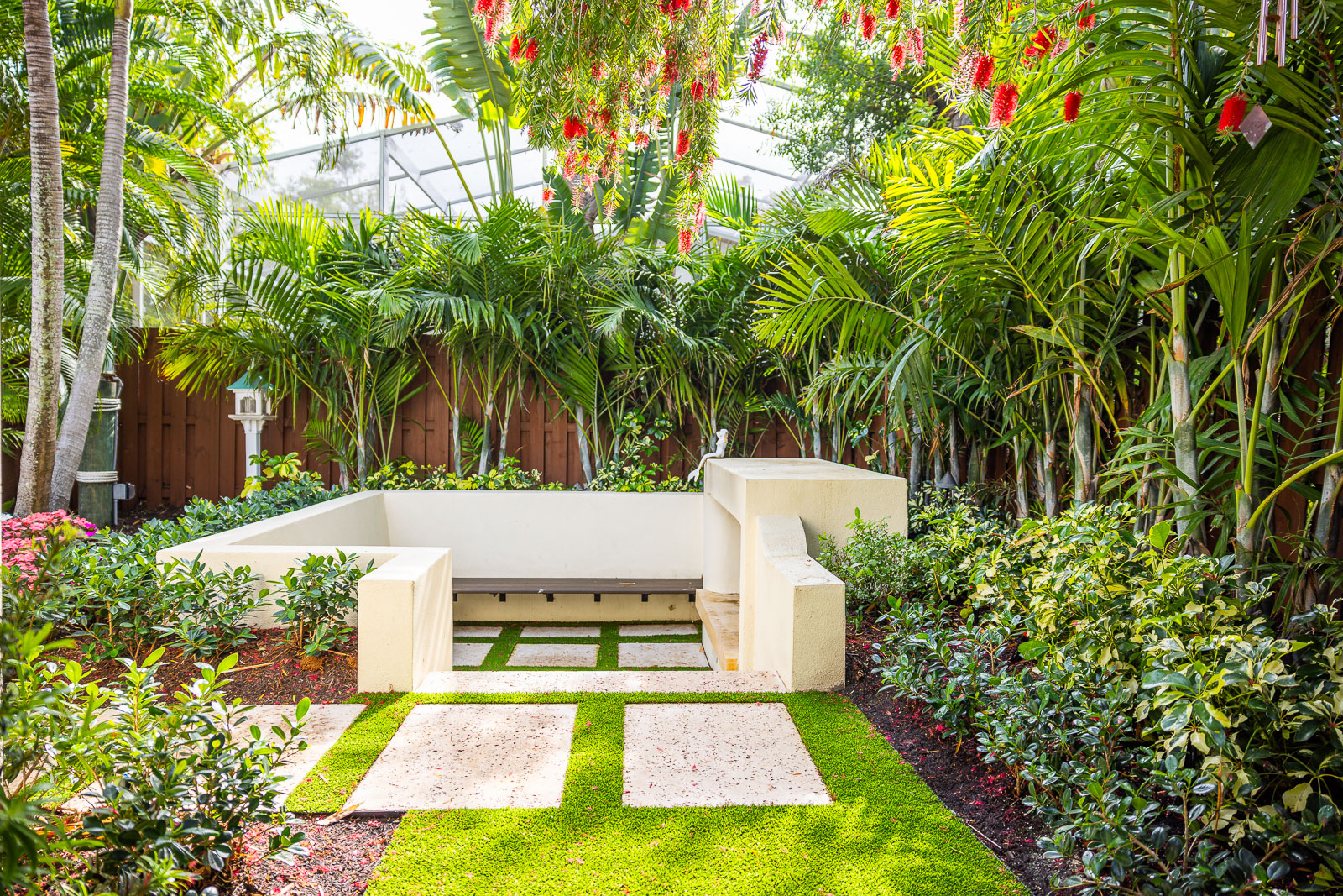 sunken garden with paver path and landscape beds 2