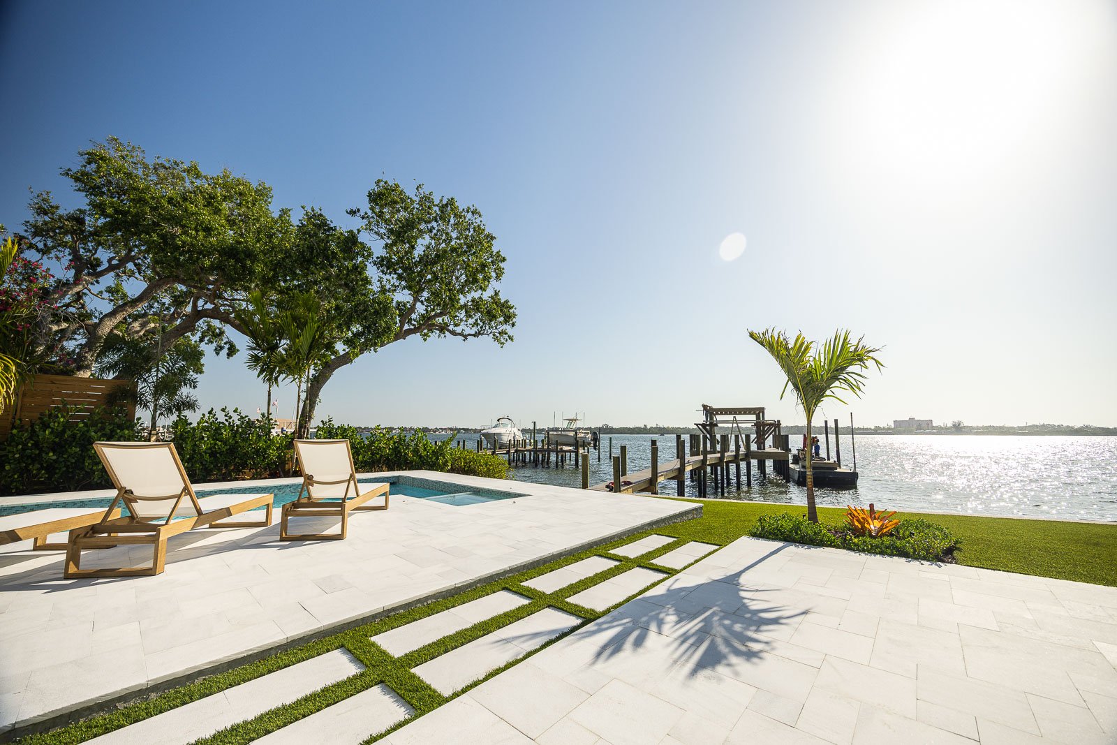 backyard patio outdoor seating pool water landscape beds 1