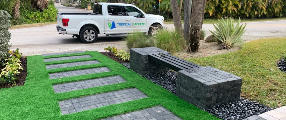 Artificial turf professional installed for walkway at home in Longboat Key, FL.
