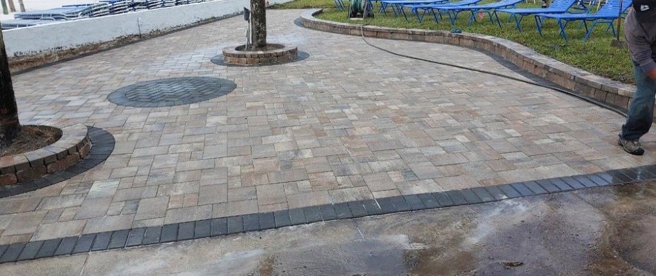 Professional cleaning patio pavers in Siesta Key, FL.
