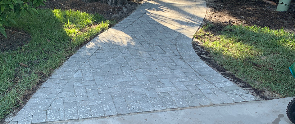 Walkway installed beside patio in Holmes Beach, FL.